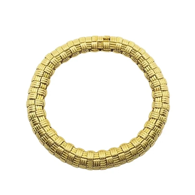 VINTAGE CARTIER PARIS 18K GOLD RETRO GRID LINK BRACELET, 1950S-1970S: VINTAGE CARTIER PARIS 18K GOLD RETRO GRID LINK BRACELET, 1950S-1970S DESIGNER Cartier CIRCA 1950s - 70s MATERIALS 18K Yellow Gold WEIGHT 49.8 Grams MEASUREMENTS 5/16" x 7 1/2” HALLMARKS Cartier,