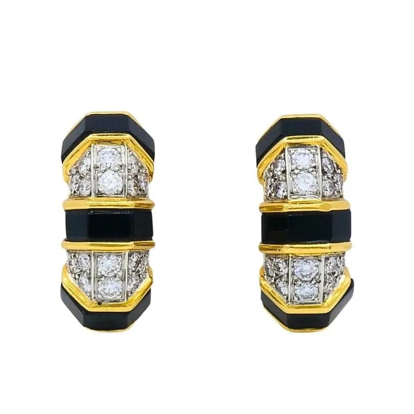 TIFFANY & CO. 18K GOLD ONYX DIAMOND HOOP EARRINGS: TIFFANY & CO. 18K GOLD ONYX DIAMOND HOOP EARRINGS DESIGNER: Tiffany & Co. CIRCA: Late 20th Century MATERIALS: 18k Gold GEMSTONE: Onyx, Diamond WEIGHT: 15.3 Grams MEASUREMENTS: 3/8" x 7/8" HALLMARKS: T