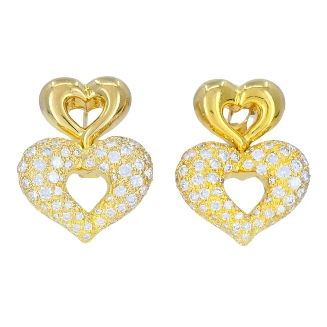 VINTAGE VAN CLEEF & ARPELS 18K GOLD DIAMOND DOUBLE HEART EARRINGS: VINTAGE VAN CLEEF & ARPELS 18K GOLD DIAMOND DOUBLE HEART EARRINGS KL IEIO A romantic and iconic design by Van Cleef & Arpels, these heart-shaped earrings are crafted in 18K yellow gold and set with br