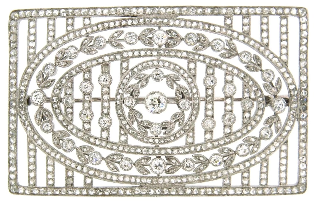 EDWARDIAN DIAMOND PLATINUM BROOCH PIN OPEN-WORK 1910S 3.47 CTS: EDWARDIAN DIAMOND PLATINUM BROOCH PIN OPEN-WORK 1910S 3.47 CTS Edwardian (c. 1910’s) Diamond & Platinum Open-work Brooch This stunning antique brooch is one-of-a-kind piece and now you have a chance