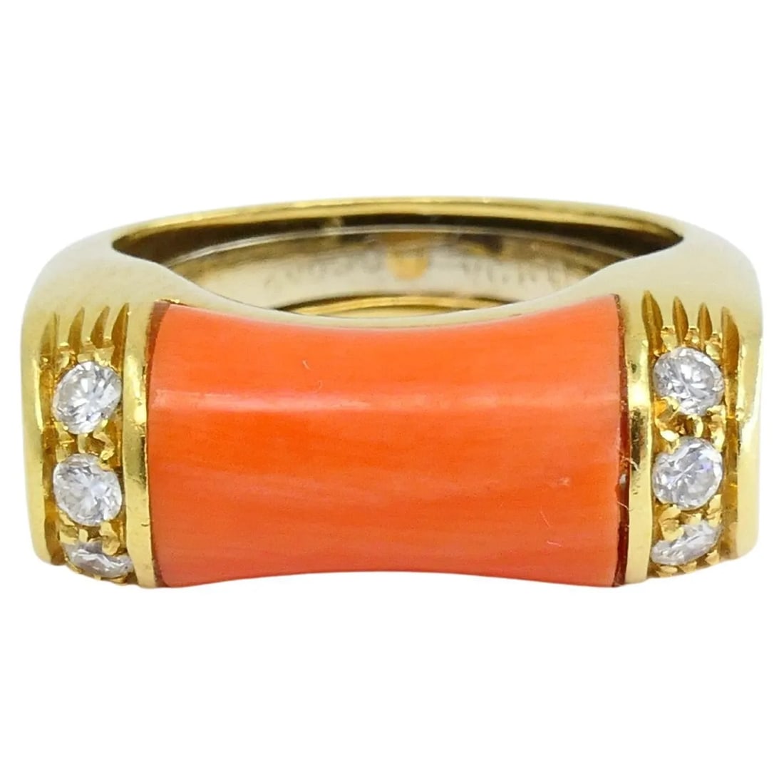 VAN CLEEF & ARPELS RING CORAL DIAMOND 18K GOLD: VAN CLEEF & ARPELS RING CORAL DIAMOND 18K GOLD Van Cleef & Arpels Ring Coral Diamond 18k Gold A Van Cleef & Arpels ring crafted in 18k gold and coral, accented with diamonds. The coral, shaped like a 