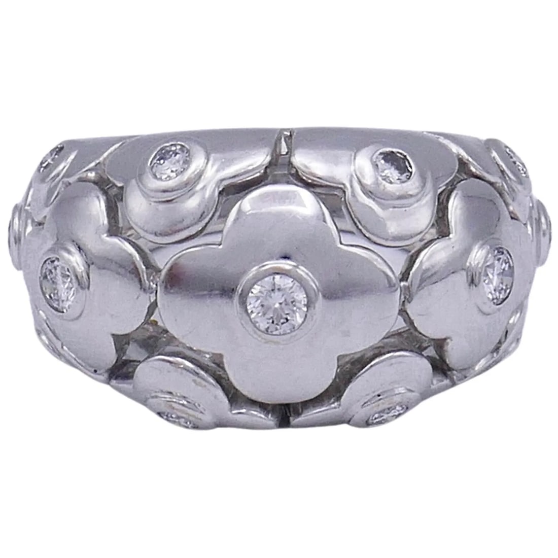 VAN CLEEF & ARPELS ALHAMBRA RING WHITE GOLD DIAMOND: VAN CLEEF & ARPELS ALHAMBRA RING WHITE GOLD DIAMOND A Van Cleef & Arpels Alhambra domed ring, made of 18k white gold, featuring diamond. Diamonds are round brilliant cut. 13 stones in total, carat wei