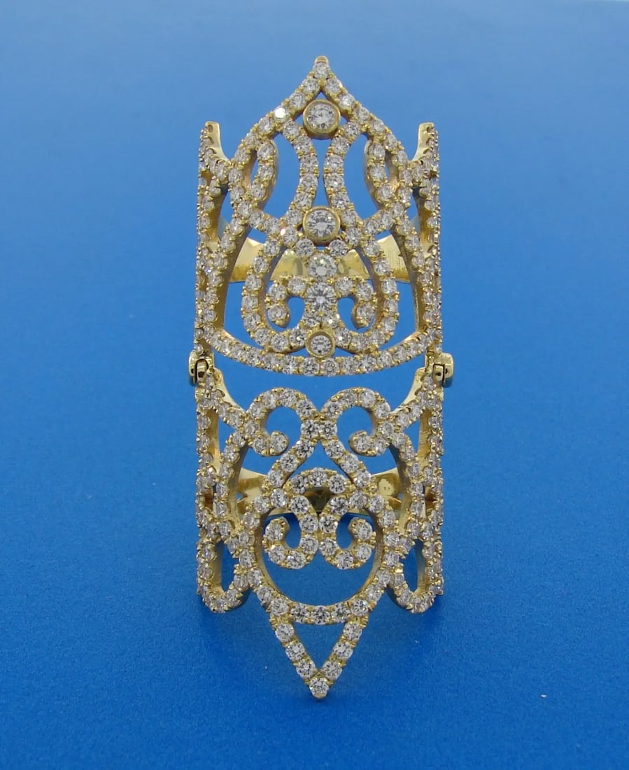 TRENDY DIAMOND YELLOW GOLD FULL-FINGER RING WIDE BAND CHIC: TRENDY DIAMOND YELLOW GOLD FULL-FINGER RING WIDE BAND CHIC Diamond Yellow Gold Full-Finger Ring Wonderful ring that is a great addition to your collection. Weight is 14.2 grams. Made of 18 karat (stam