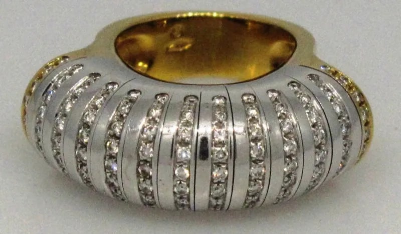 MARVELOUS DIAMOND 18K WHITE AND YELLOW GOLD RING DISCO QUEEN CIRCA 1970: MARVELOUS DIAMOND 18K WHITE AND YELLOW GOLD RING DISCO QUEEN CIRCA 1970 Marvelous Disco Queen Circa 1970 Diamond, 18k White & Yellow Gold Ring This glamorous ring, circa 1970 begins with a combination