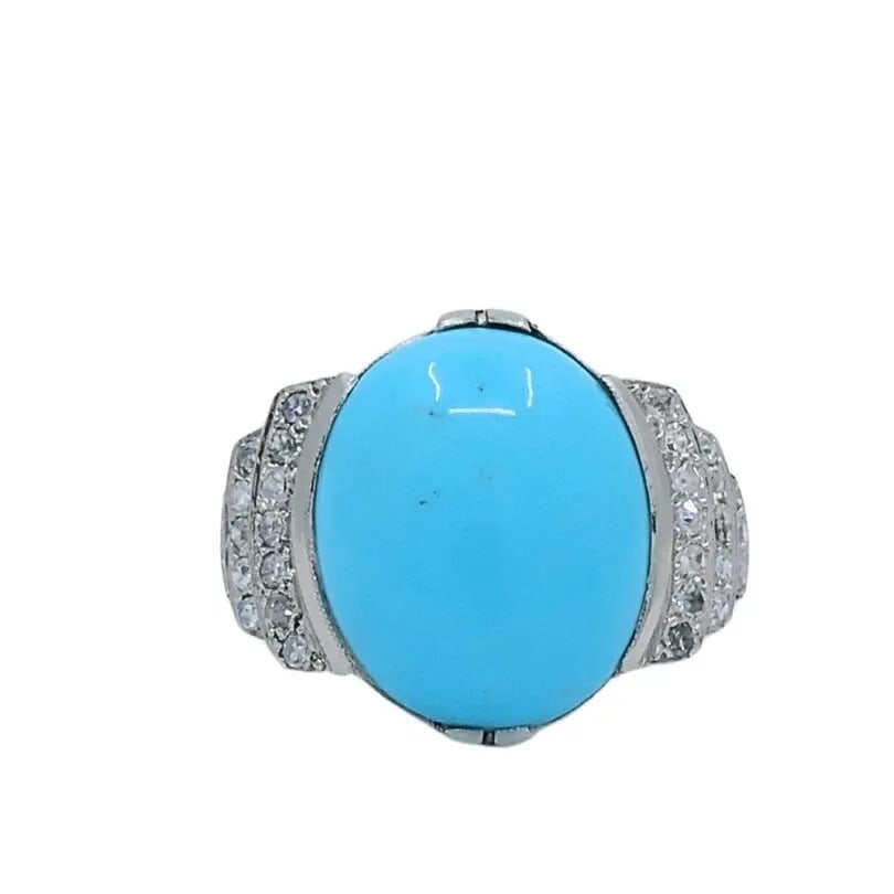 FRENCH TURQUOISE RING DIAMOND 18K WHITE GOLD: FRENCH TURQUOISE RING DIAMOND 18K WHITE GOLD Product details: CIRCA: Early 20th Century MATERIALS: 18k Gold GEMSTONE: Turquoise, Diamond WEIGHT: 6.3 Grams RING SIZE: 5.25 MEASUREMENTS: Stone - 1/2" x 
