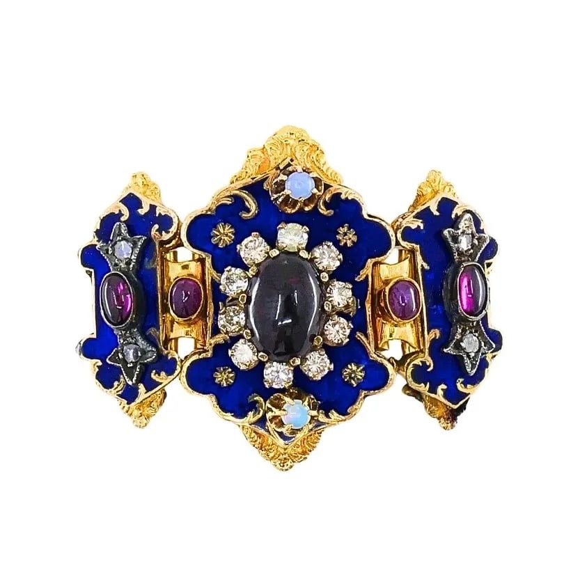 ANTIQUE VICTORIAN 14K GOLD GEMSTONE ENAMEL BUCKLE: ANTIQUE VICTORIAN 14K GOLD GEMSTONE ENAMEL BUCKLE ES JETO Product details: MATERIALS: 14k Gold, Enamel GEMSTONE: Garnet, Diamond, Opal WEIGHT: 26.3 Grams MEASUREMENTS: 1 1/2" x 1 5/8" ITEM DETAILS: An