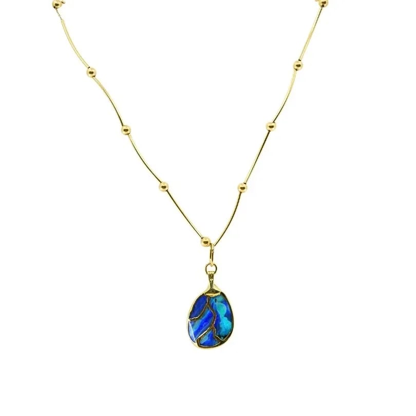 OPAL NECKLACE 14K GOLD COLLAR NECKLACE WITH BEADS: OPAL NECKLACE 14K GOLD COLLAR NECKLACE WITH BEADS DESIGNER: Unknown CIRCA: Late 20th Century MATERIALS: 14K Gold, 10K Gold GEMSTONE: Opal WEIGHT: 11.9 Grams MEASUREMENTS: Pendant - 13/16" x 1 1/4" Cha
