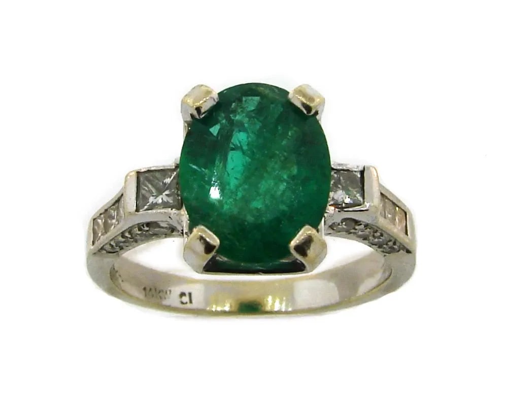 EMERALD DIAMOND WHITE GOLD RING SOLITAIRE WITH ACCENTS: EMERALD DIAMOND WHITE GOLD RING SOLITAIRE WITH ACCENTS 2.14-carat EMERALD DIAMOND 14 karat WHITE GOLD RING Stunning classy ring - great addition to your jewelry collection. Weight 4.0 grams. Made of 1