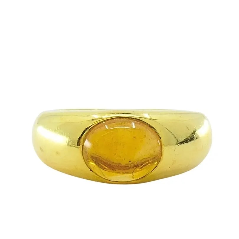 TIFFANY & CO. 18K GOLD CITRINE CABOCHON RING: TIFFANY & CO. 18K GOLD CITRINE CABOCHON RING DESIGNER Tiffany & Co. CIRCA 1980s MATERIALS 18k Gold GEMSTONE Citrine WEIGHT 8.7 Grams MEASUREMENTS 6 - 6.25 MEASUREMENT Stone - 1/4" x 3/8" HALLMARKS Tif