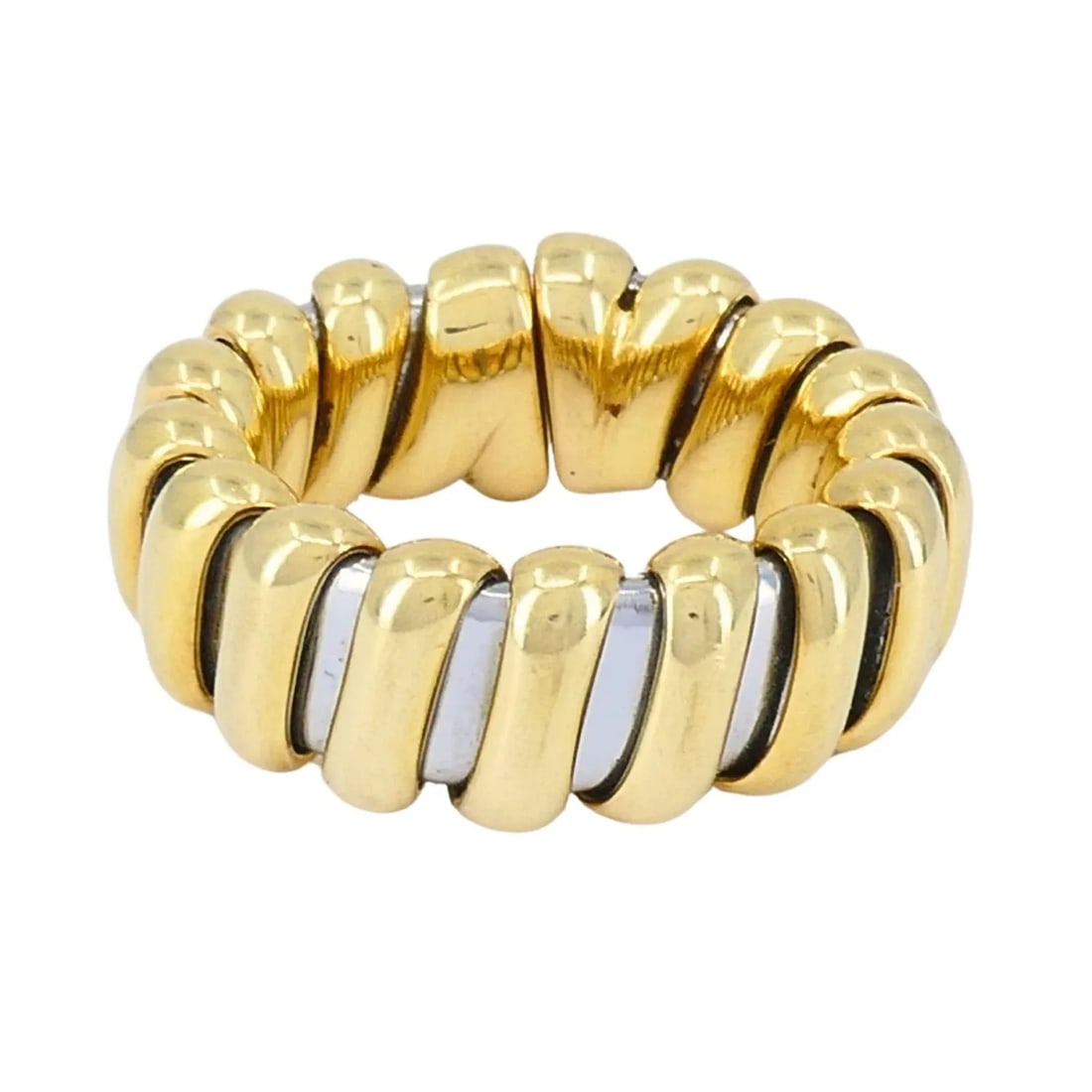VINTAGE BVLGARI 18K GOLD STAINLESS STEEL RING: VINTAGE BVLGARI 18K GOLD STAINLESS STEEL RING This vintage Bvlgari ring is a striking example of the house’s sculptural Italian design from the 1980s. Crafted in 18K yellow and white gold, the ring 