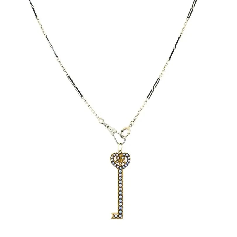 14K GOLD KEY PENDANT NECKLACE PEARLS AND BLACK ENAMEL: 14K GOLD KEY PENDANT NECKLACE PEARLS AND BLACK ENAMEL DESIGNER: Unknown MATERIALS: 14k Gold, Enamel WEIGHT: 9.6 Grams MEASUREMENTS: Pendant - 1/2" x 1 1/2" Chain - 13 1/2" HALLMARKS: 14K ITEM DETAILS: