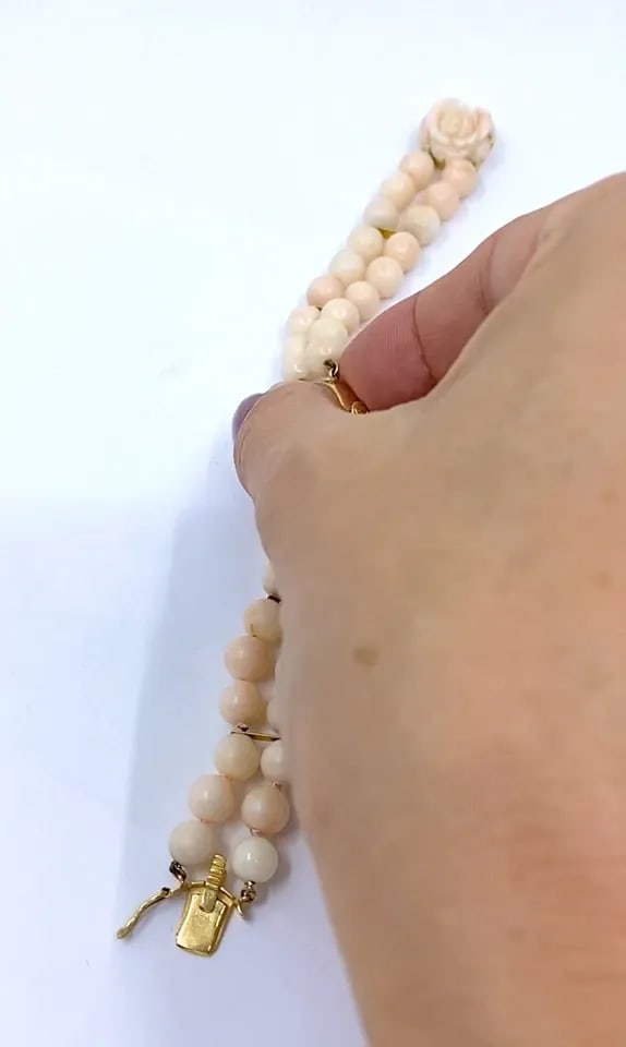 BAUME & MERCIER 14K ANGEL SKIN CORAL DOUBLE STRAND BRACELET WATCH, 1960S: BAUME & MERCIER 14K ANGEL SKIN CORAL DOUBLE STRAND BRACELET WATCH, 1960S ES JAOO ITEM DETAILS Baume & Mercier 14k Angel Skin Coral Double Strand Bracelet Watch, 1960s A feminine vintage Baume & Mercie