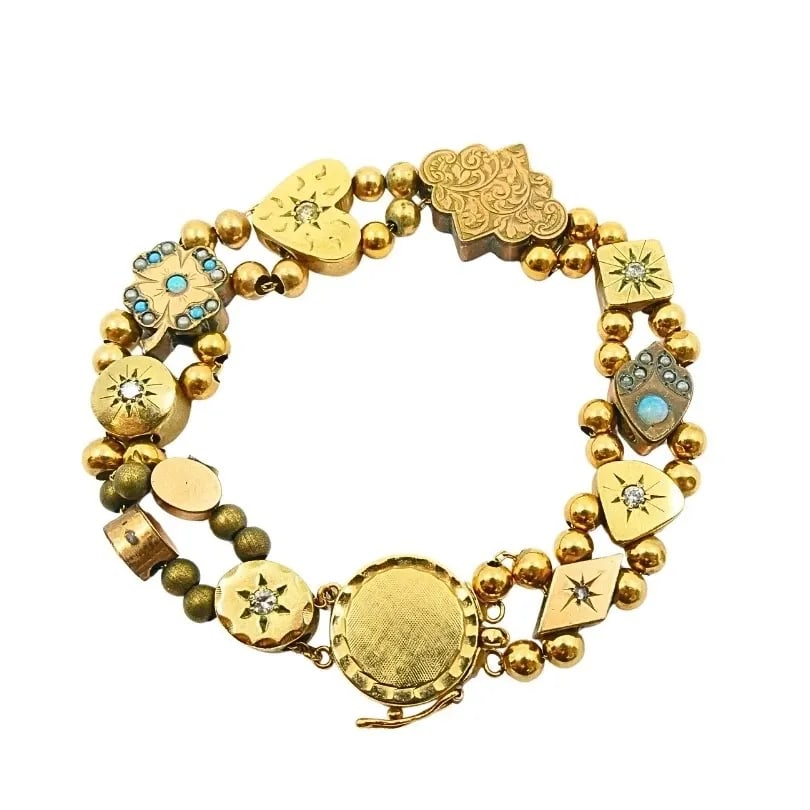ANTIQUE 14K & 10K GOLD SLIDE BRACELET GEMSTONES: ANTIQUE 14K GOLD SLIDE BRACELET GEMSTONES DESIGNER: Unknown CIRCA: Late 19th Century MATERIALS: 14k Gold GEMSTONE: Diamond WEIGHT: 15 Grams MEASUREMENTS: 1/2” x 6 7/8" HALLMARKS: 14K ITEM DETAIL