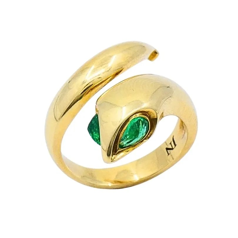 14K GOLD SNAKE PEAR-CUT EMERALD EYES WRAP RING: 14K GOLD SNAKE PEAR-CUT EMERALD EYES WRAP RING ES RTO Product details: MATERIALS: 14k Gold GEMSTONE: Emerald WEIGHT: 8.7 Grams MEASUREMENTS: Top Width Snake Head - 5/16" RING SIZE: 6.5 - 6.75 HALLMARK