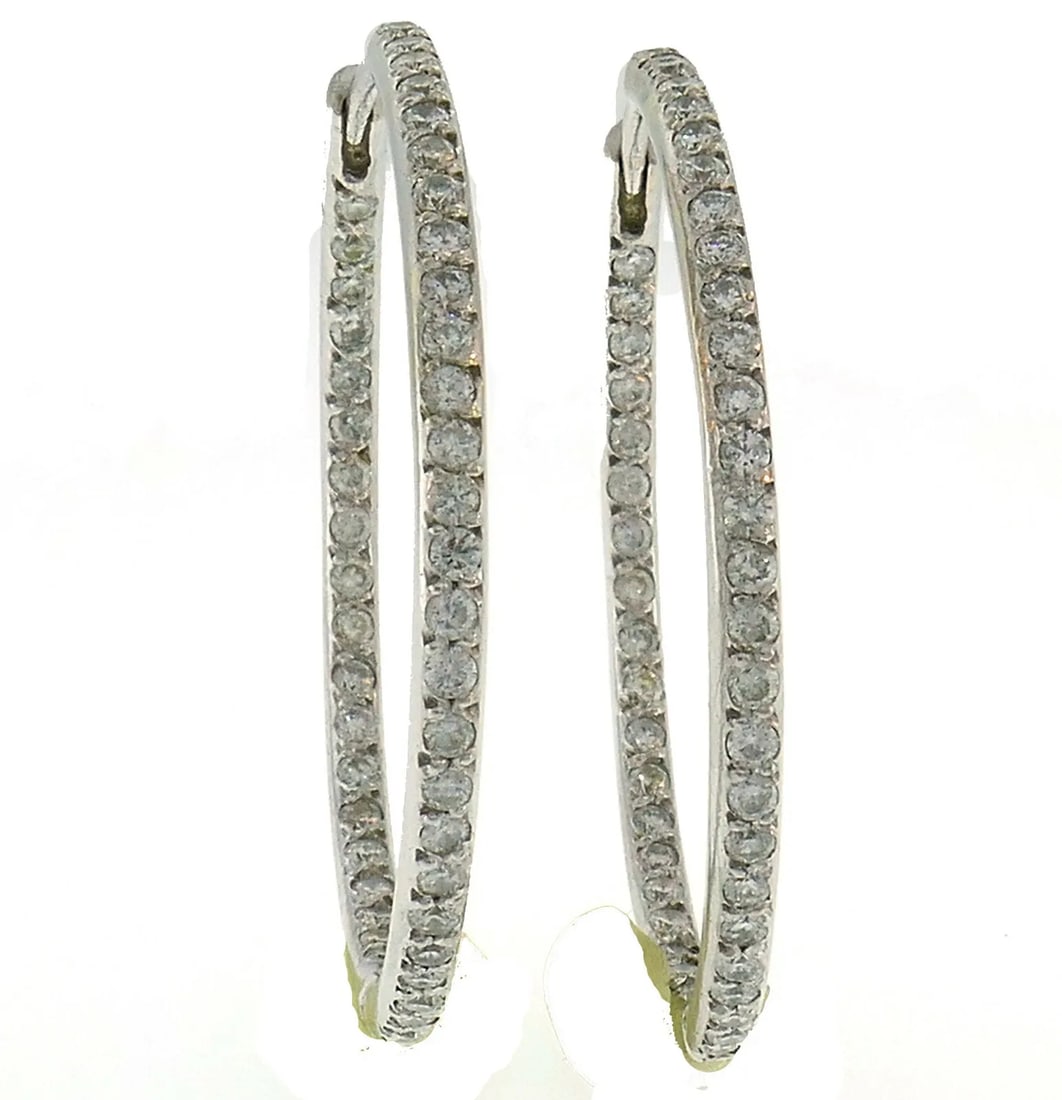 VINTAGE DIAMOND WHITE GOLD HOOP EARRINGS: VINTAGE DIAMOND WHITE GOLD HOOP EARRINGS Diamond 14 karat White Gold Hoop Earrings Timeless and wearable hoop earrings. Made of 14 karat white gold and set with round brilliant cut diamonds (I-J color