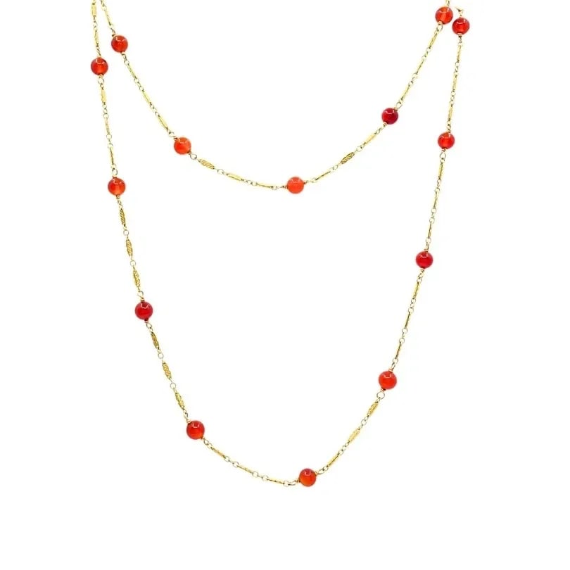 VINTAGE 14K GOLD CARNELIAN BEAD NECKLACE: VINTAGE 14K GOLD CARNELIAN BEAD NECKLACE ES ETO Product details: MATERIALS: 14k Gold GEMSTONE: Carnelian WEIGHT: 10 Grams MEASUREMENTS: Length - 29" ITEM DETAILS: Vintage 14k Gold Carnelian Bead Neckl