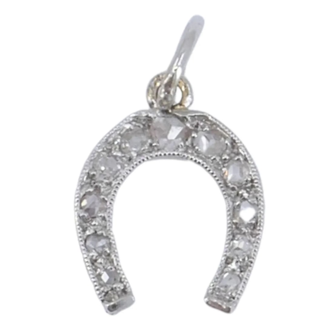 EDWARDIAN PLATINUM ROSE CUT DIAMOND HORSESHOE PENDANT: Edwardian Platinum Rose Cut Diamond Horseshoe Pendant KL ITO This antique platinum rose cut diamond horseshoe charm dates to the Edwardian period, circa 1910 to 1920. The design features a classic hor