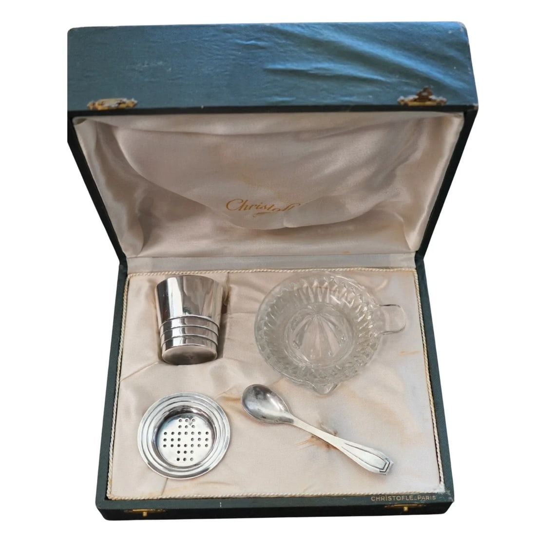 FRENCH 1930S CHRISTOFLE SILVER PLATED JUICER SET: FRENCH 1930S CHRISTOFLE SILVER PLATED JUICER SET KL NTO Vintage Christofle Paris four-piece juice set in its original box. Circa 1930s, this set includes a tumbler, a glass lemon squeezer, a spoon and