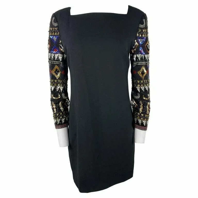 I. MAGNIN BLACK MINI EVENING DRESS: I. MAGNIN BLACK MINI EVENING DRESS I. MAGNIN BLACK MINI EVENING DRESS The dress features mini length, long sleeves with multicolored rhinestones design, rear zip closure. Length: 35 in. (88.9 cm) Bust
