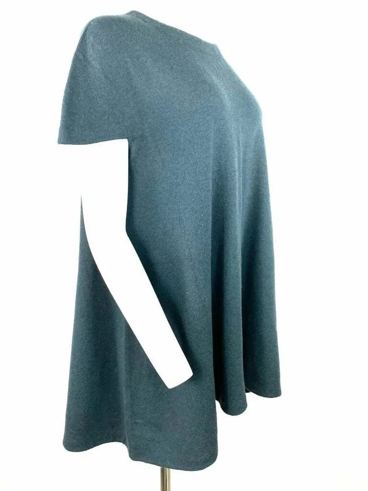 VINTAGE BALENCIAGA NAVY KNIT MINI DRESS, SIZE 40: VINTAGE BALENCIAGA NAVY KNIT MINI DRESS, SIZE 40 VINTAGE BALENCIAGA NAVY KNIT MINI DRESS, SIZE 40 The dress is designed by Balenciaga, it is made out of wool and it features navy knit finish, crew nec