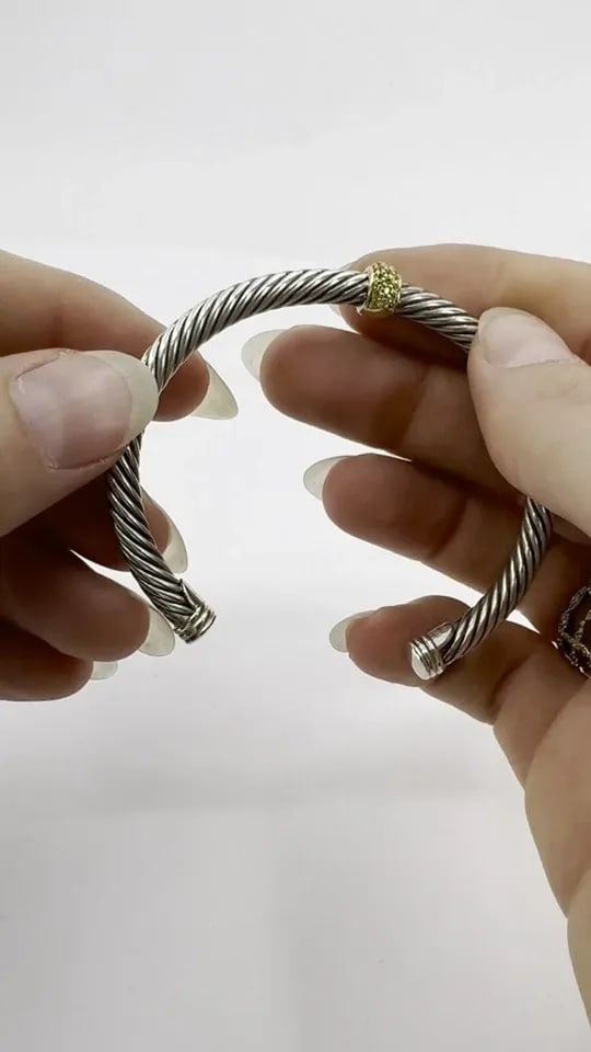 DAVID YURMAN 18K GOLD STERLING SILVER SAPPHIRE STATION CABLE CUFF BRACELET: DAVID YURMAN 18K GOLD STERLING SILVER SAPPHIRE STATION CABLE CUFF BRACELET KL UTO This David Yurman 5 mm cable bracelet is crafted in sterling silver and 18k yellow gold, incorporating the brand’s w