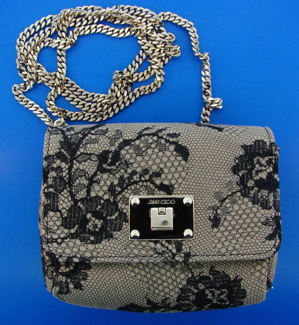 CHIC JIMMY CHOO MINI LACE BAG WITH DUSTBAG: CHIC JIMMY CHOO MINI LACE BAG WITH DUSTBAG . Our telephone number is 310 860 9991. EXCITING NEWS. Now we are offering FREE Domestic shipping with full insurance coverage. International buyers are resp