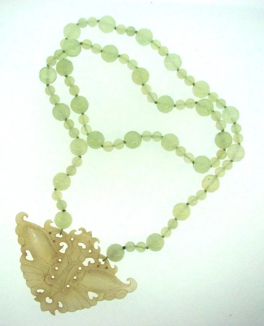 VINTAGE JADE BEAD STATEMENT NECKLACE: VINTAGE JADE BEAD STATEMENT NECKLACE Jade Necklace Vintage This is a must for a collector! The weight is 120 grams. The length is 33 inches. The length of pendant is 3 5/8 inches. The height of pendan