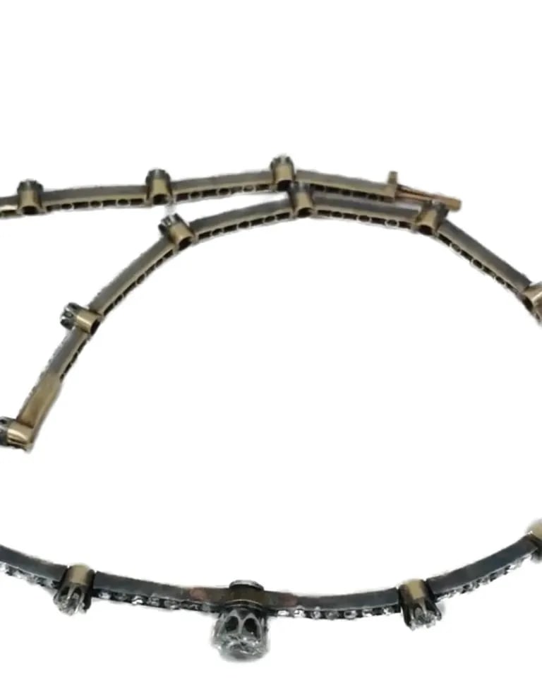 ANTIQUE GOLD AND SILVER DIAMOND CHOKER NECKLACE: ANTIQUE GOLD AND SILVER DIAMOND CHOKER NECKLACE NS JUTOO Antique 18k Gold Silver Diamond Necklace An antique necklace, crafted from a combination of silver and 18k gold and set with diamonds. The desi