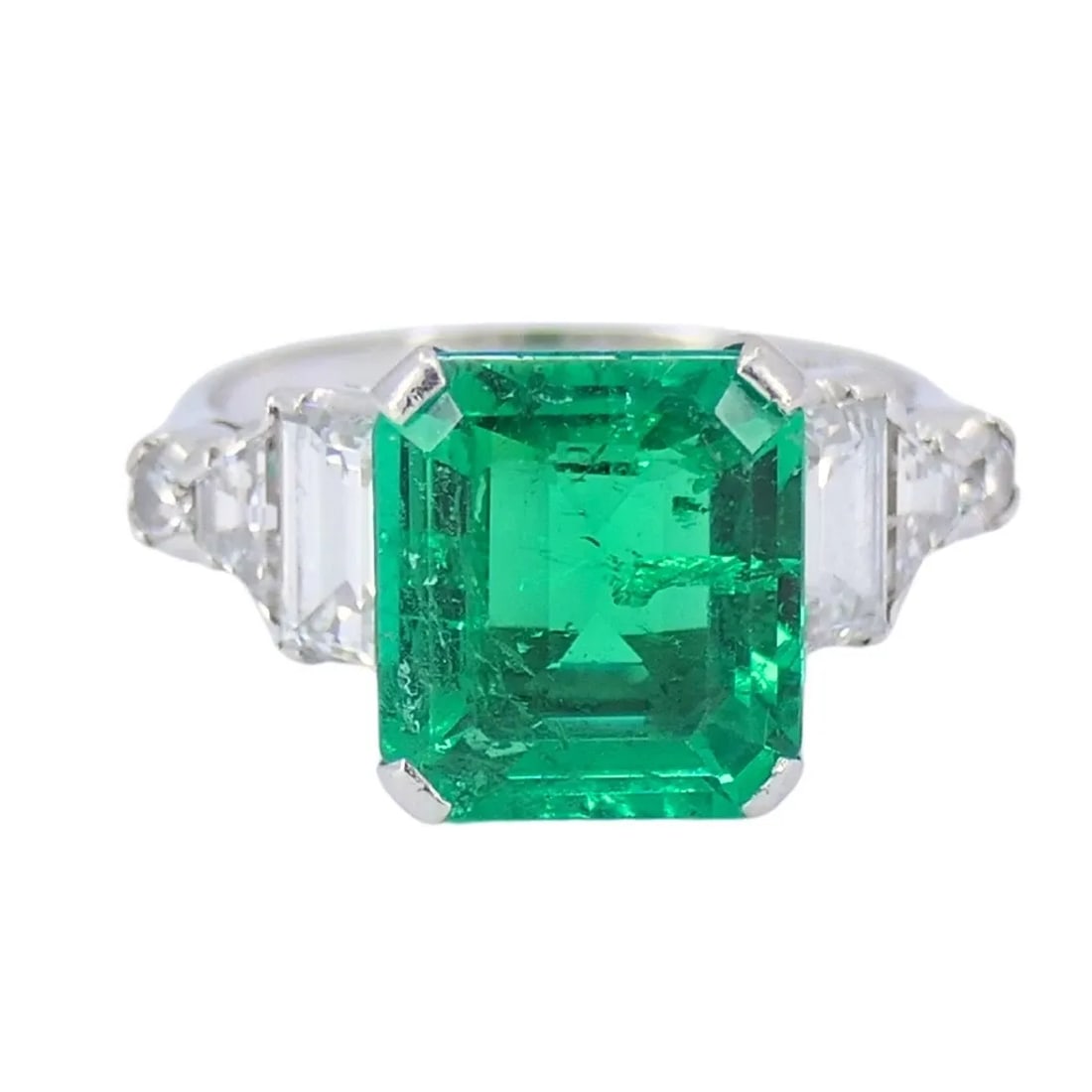 COLOMBIAN EMERALD ENGAGEMENT RING GIA PLATINUM DIAMOND: COLOMBIAN EMERALD ENGAGEMENT RING GIA PLATINUM DIAMOND NS ROOO Colombian Emerald Engagement Ring GIA Platinum Diamond An engagement diamond ring made of platinum and featuring a Colombian emerald that