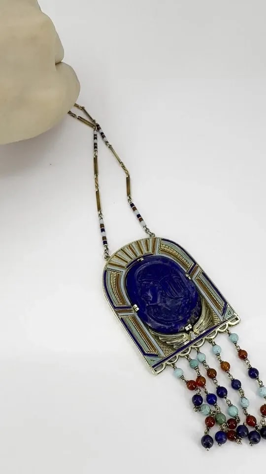 EGYPTIAN REVIVAL 14K GOLD GEMSTONES ENAMEL PENDANT NECKLACE: EGYPTIAN REVIVAL 14K GOLD GEMSTONES ENAMEL PENDANT NECKLACE A magnificent example of Art Deco Egyptian Revival design, this early 20th century necklace captures the allure of ancient symbolism through