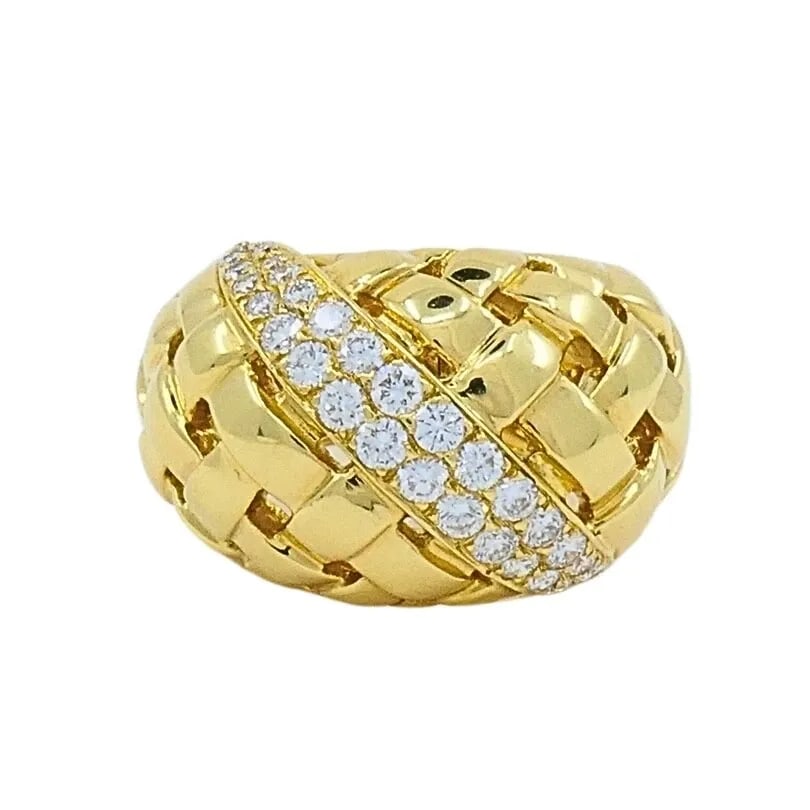 TIFFANY AND CO. 18K GOLD DIAMOND DOME VANNERIE RING: TIFFANY AND CO. 18K GOLD DIAMOND DOME VANNERIE RING Product details: DESIGNER: Tiffany & Co. CIRCA: 1990’s MATERIALS: 18k Yellow Gold GEMSTONE: Round Brilliant Cut Diamond WEIGHT: 14.2 Grams MEASURE