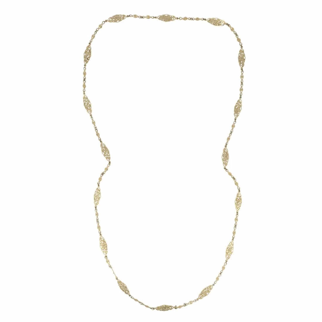 VINTAGE 14K GOLD OPENWORK FILIGREE MARQUISE LONG CHAIN NECKLACE: VINTAGE 14K GOLD OPENWORK FILIGREE MARQUISE LONG CHAIN NECKLACE KL UNOO 14K gold long chain necklace dating to the 1970s. The design features repeating openwork marquise shaped stations with a pierced
