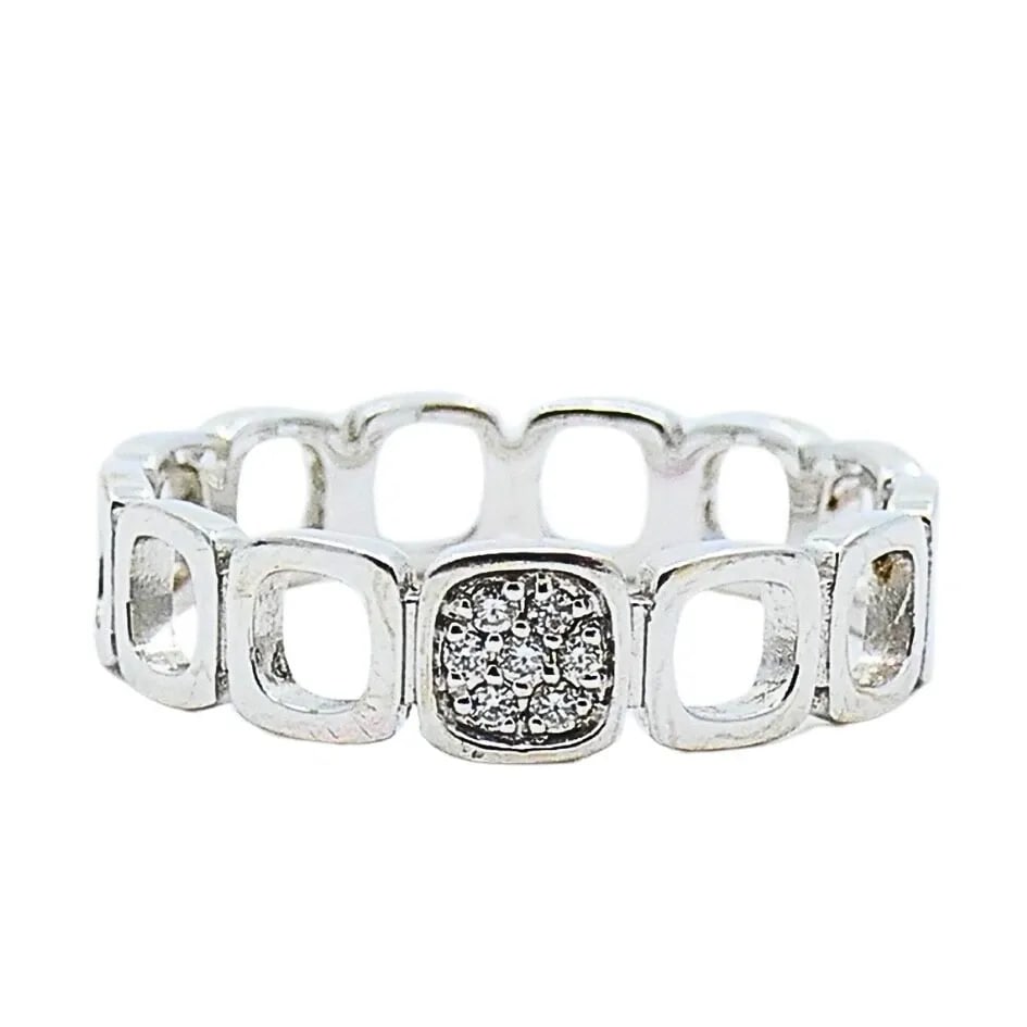 DINH VAN 18K WHITE GOLD RING DIAMOND BAND: DINH VAN 18K WHITE GOLD RING DIAMOND BAND DESIGNER: Jean Dinh Van CIRCA: 1970s MATERIALS: 18k Gold GEMSTONE: Diamond WEIGHT: 2.3 Grams MEASUREMENTS: 3/16" Width RING SIZE: 6-6.25 HALLMARKS: Dinh Van, 