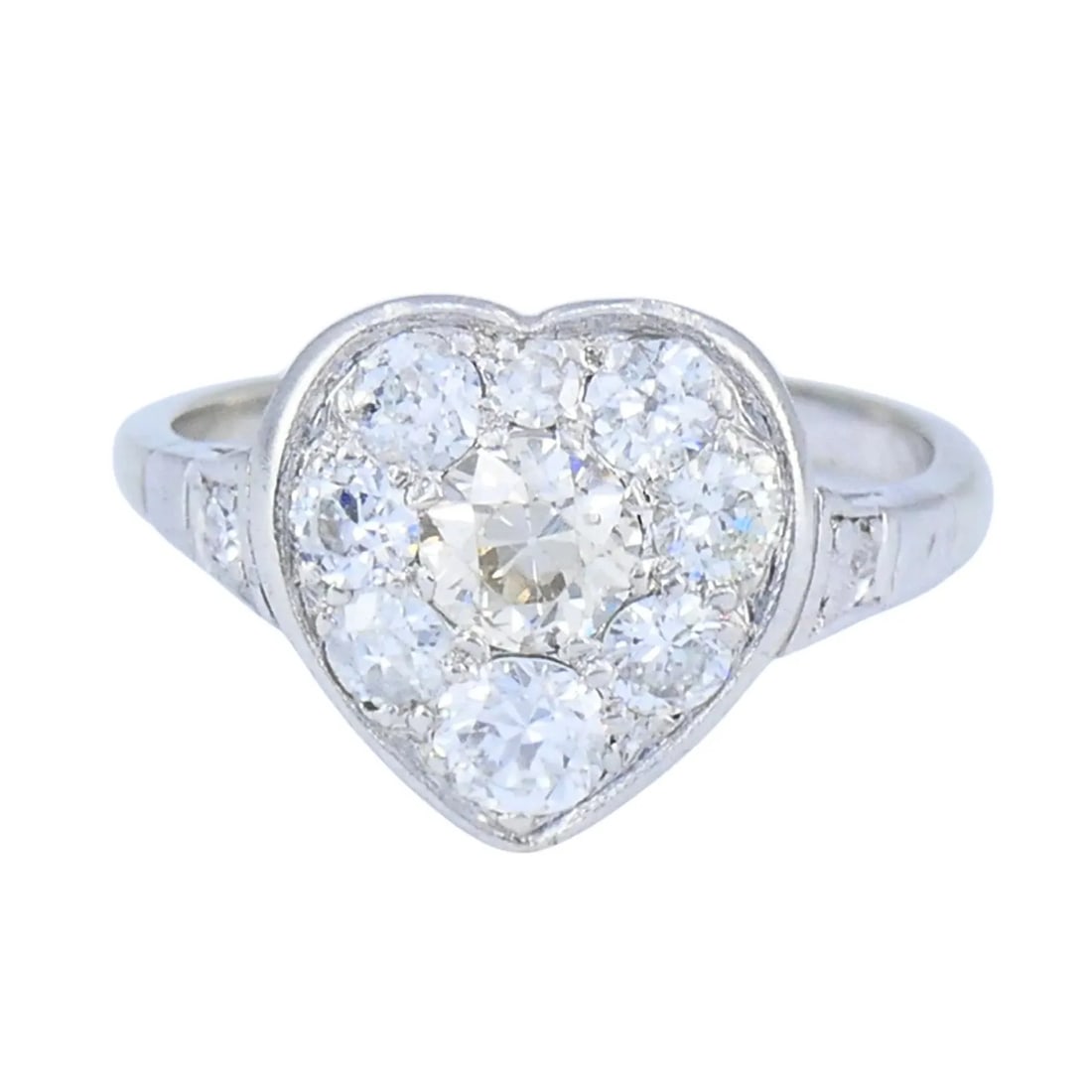 VINTAGE ART DECO DIAMOND HEART CLUSTER RING 10K GOLD PLATINUM: VINTAGE ART DECO DIAMOND HEART CLUSTER RING 10K GOLD PLATINUM KL JOOO This vintage Art Deco diamond heart cluster ring is crafted with a 10k white gold band and a platinum diamond setting, a construct