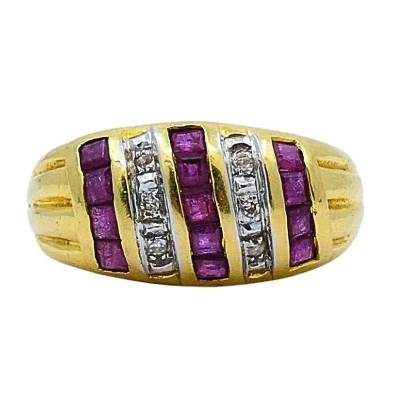 VINTAGE DOME RING 18K GOLD FRENCH DIAMOND RUBY: DESIGNER: Unknown CIRCA: 1980’s MATERIALS: 18k Yellow Gold GEMSTONE: Diamond & Ruby WEIGHT: 6.5 Grams MEASUREMENTS: 3/8" x 9/16" RING SIZE: 6.25 HALLMARKS: French Gold Mark ITEM DETAILS: Vintage Dom