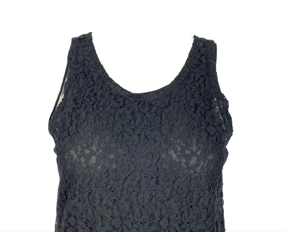 CHRISTIAN DIOR PARIS BLACK SILK FLORAL LACE TOP TUNIC: CHRISTIAN DIOR PARIS BLACK SILK FLORAL LACE TOP TUNIC CHRISTIAN DIOR PARIS BLACK SILK FLORAL LACE TOP TUNIC Sleeveless with u- neck cut line Includes one black silk under top and one see- through flor