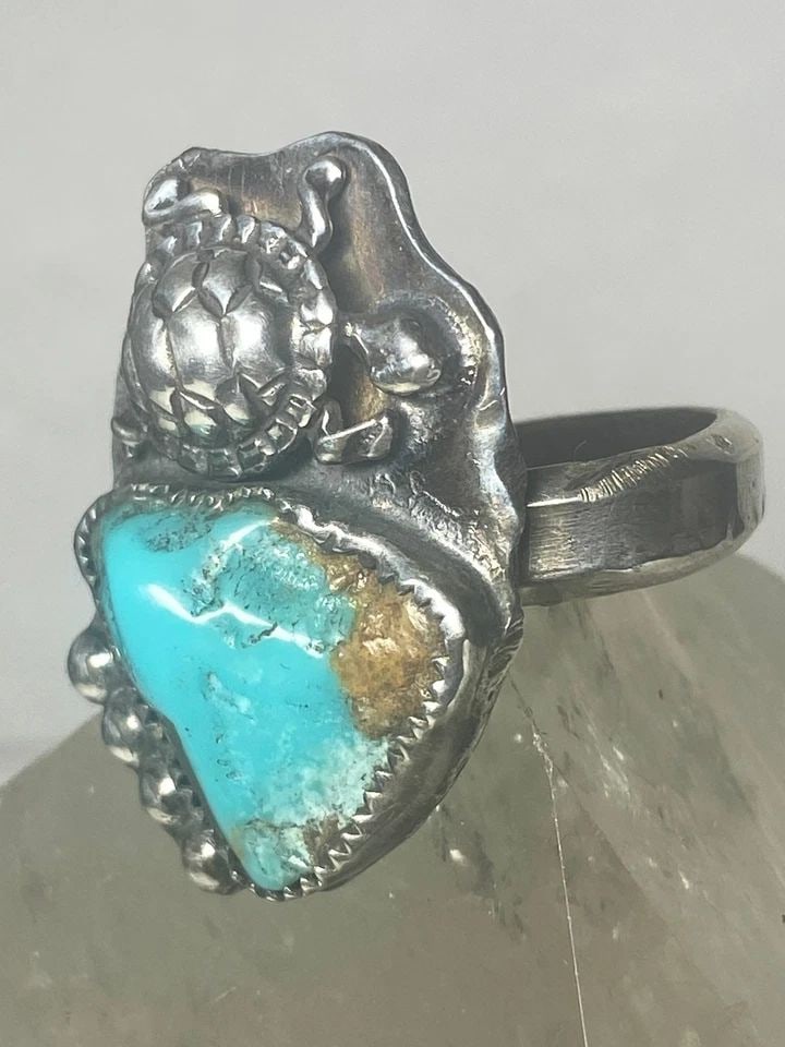 TURTLE RING TURQUOISE TRIBAL SOUTHWEST STERLING SILVER: TURTLE RING TURQUOISE TRIBAL SOUTHWEST STERLING SILVER Turtle ring turquoise tribal southwest sterling silver Size 8 slightly adjustable open end at one of the edges... Weight 16.7g Length. 1. 1/4" Wi