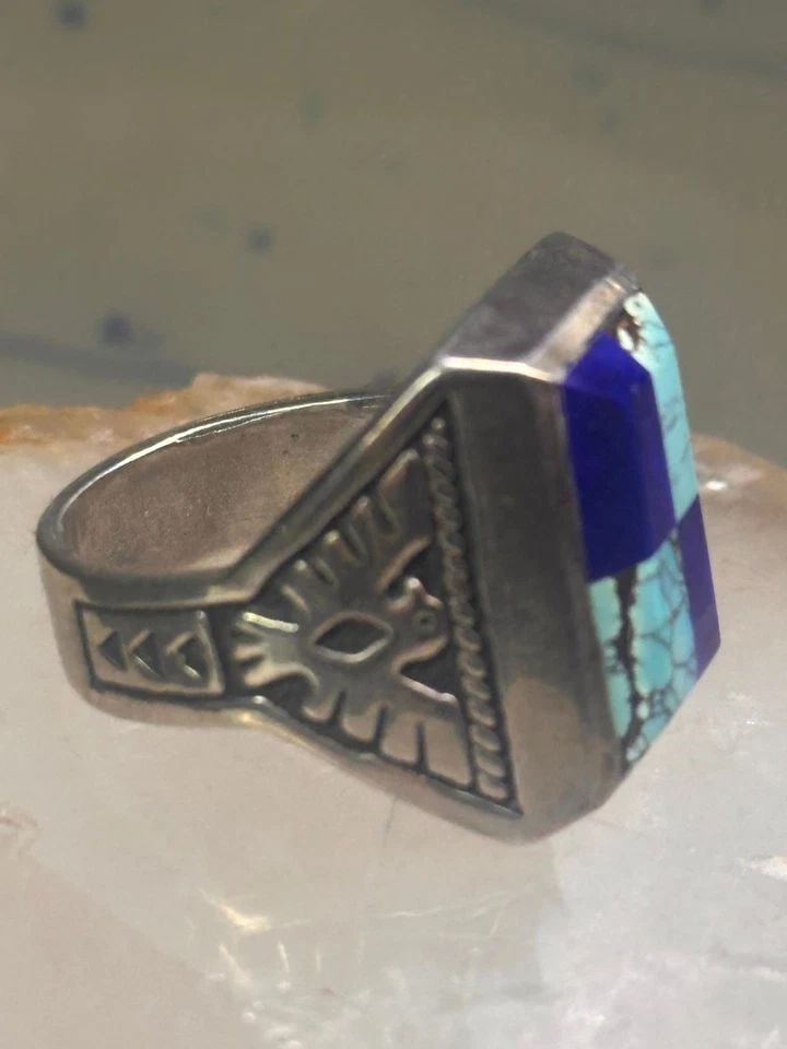 NAVAJO PHOENIX RING MUDMAN TURQUOISE HEAVY SOLID SIZE 10.5 STERLING SILVER WOMEN: NAVAJO PHOENIX RING MUDMAN TURQUOISE HEAVY SOLID SIZE 10.5 STERLING SILVER WOMEN Navajo Phoenix ring mudman Turquoise size 10.5 sterling silver women Size 10.5 Weight 24.3g Length 7/8" Width 5/8" Thin