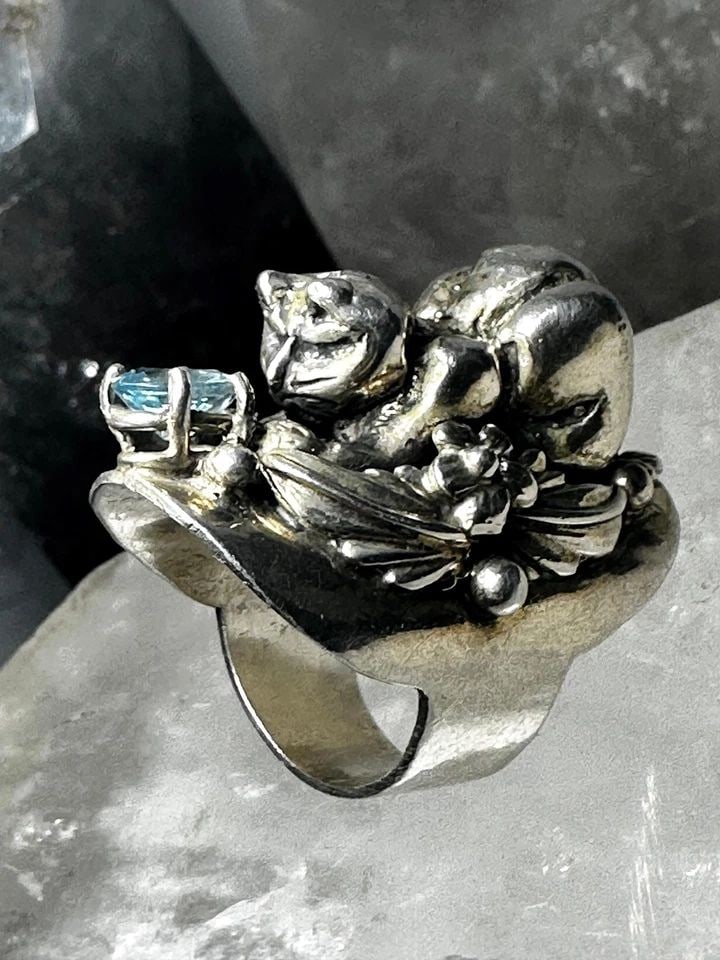 CAT RING CAROL FELLEY BAND SIZE 5 STERLING SILVER: CAT RING CAROL FELLEY BAND SIZE 5 STERLING SILVER Cat Ring Carol Felley band Size 5 Sterling Silver Size 5 Weight 23.8g Length. 1. 1/2" Width 5/8" Back on the band 3/8"
