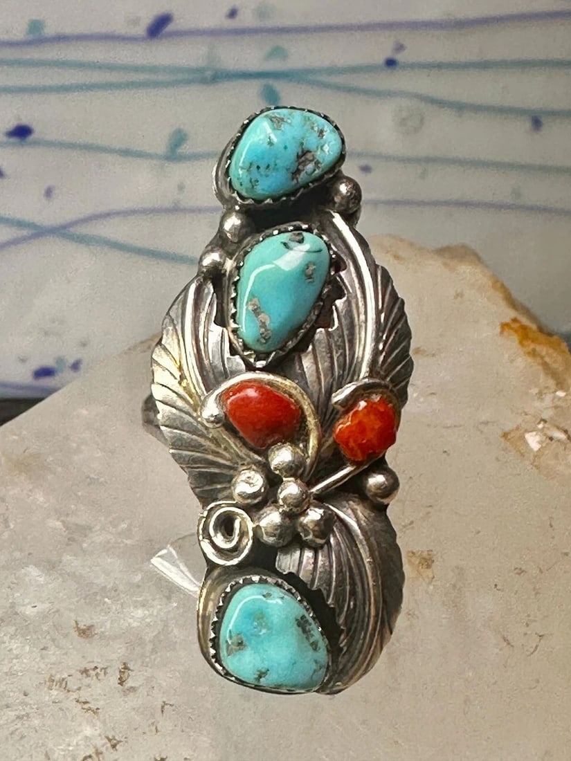 NAVAJO RING LONG TURQUOISE CORAL LEAVES SIZE 9 STERLING SILVER WOMEN: NAVAJO RING LONG TURQUOISE CORAL LEAVES SIZE 9 STERLING SILVER WOMEN Navajo ring Long Turquoise coral leaves size 9 sterling silver women Size 9 Weight. 12.5g Length 1 3/4" Width. 3/8" Thinnest part o