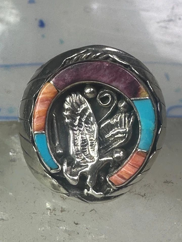 NAVAJO RING HORSESHOE EAGLE TURQUOISE SPINY OYSTER SIZE 11 STERLING SILVER MEN: NAVAJO RING HORSESHOE EAGLE TURQUOISE SPINY OYSTER SIZE 11 STERLING SILVER MEN Navajo ring Horseshoe eagle turquoise spiny oyster size 11 sterling silver men Size 11 Weight 9.8g Length. 1" Width. 3/4"