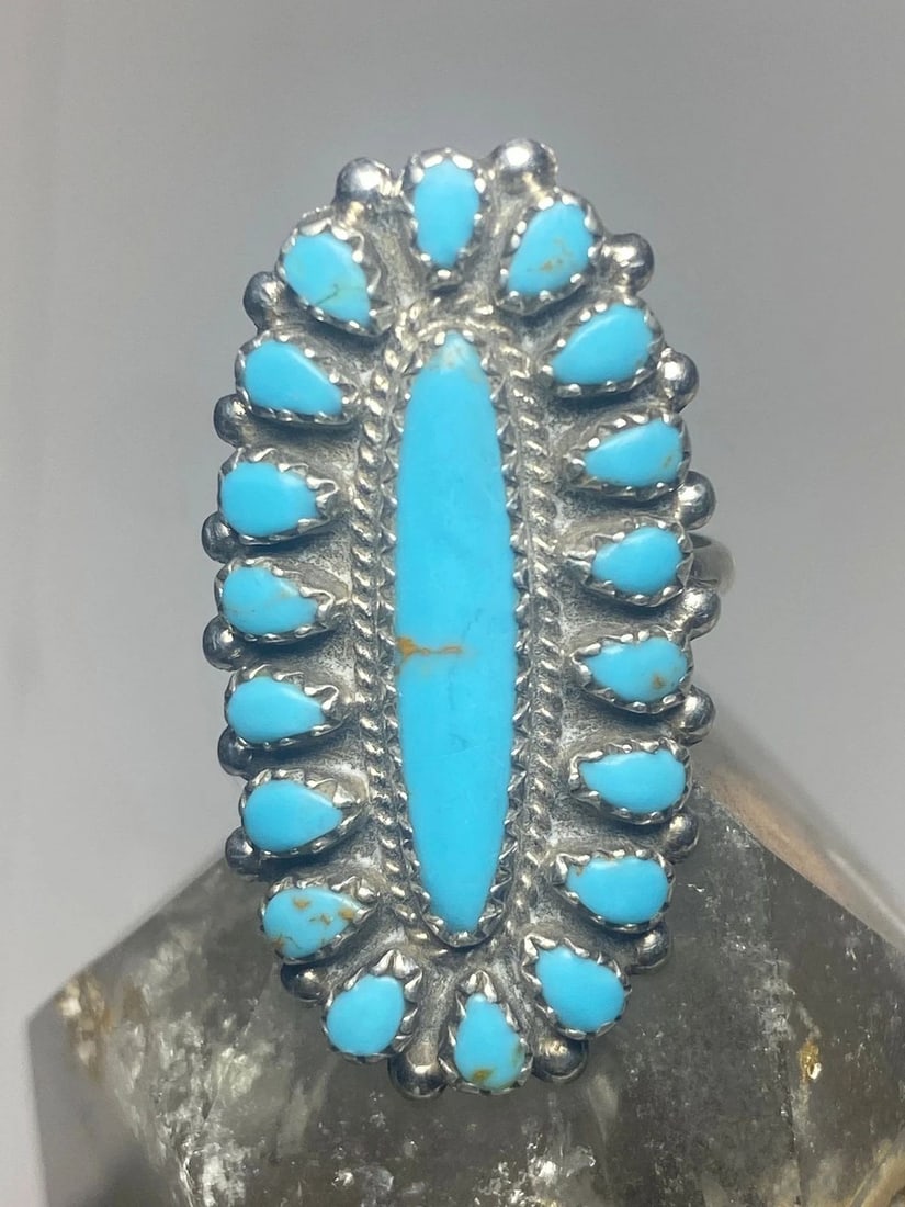 TURQUOISE RING SIZE 7.25 ZUNI LONG PETITE POINT SOUTHWEST STERLING SILVER WOMEN: TURQUOISE RING SIZE 7.25 ZUNI LONG PETITE POINT SOUTHWEST STERLING SILVER WOMEN Turquoise ring Zuni long Petite point southwest sterling silver women Size 7.25 Weight 5.9g Length. 1. 3/8" Width. 3/4" 