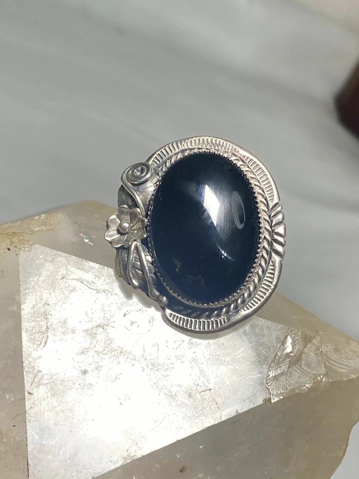 ONYX RING SIZE 7.75 NAVAJO HUGE SOUTHWEST SQUASH BLOSSOM BAND STERLING SILVER WO: ONYX RING SIZE 7.75 NAVAJO HUGE SOUTHWEST SQUASH BLOSSOM BAND STERLING SILVER WO Onyx ring Navajo huge squash blossom southwest band sterling silver women Size 7.75 Between a size 7.75 and a size 8 We