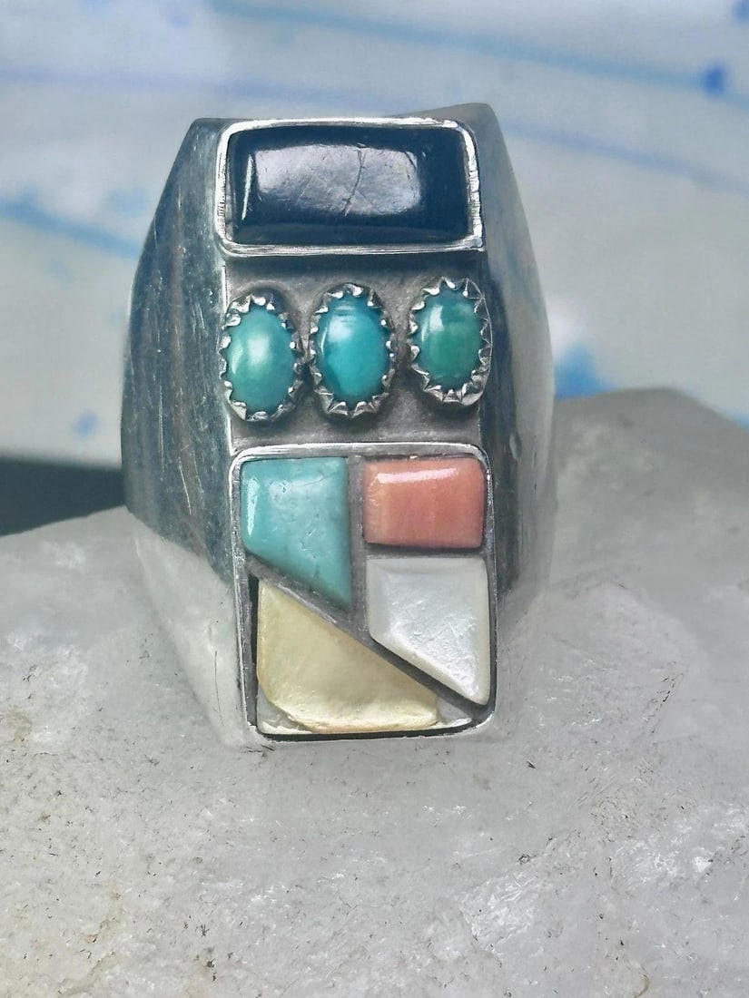 NAVAJO RING TURQUOISE CORAL ONYX MOP BAND SIZE 11 STERLING SILVER MEN: NAVAJO RING TURQUOISE CORAL ONYX MOP BAND SIZE 11 STERLING SILVER MEN Navajo Ring turquoise coral onyx mop band size 11 sterling silver men Flaws: Bottom yellowish Mother of pearl has a stone that has