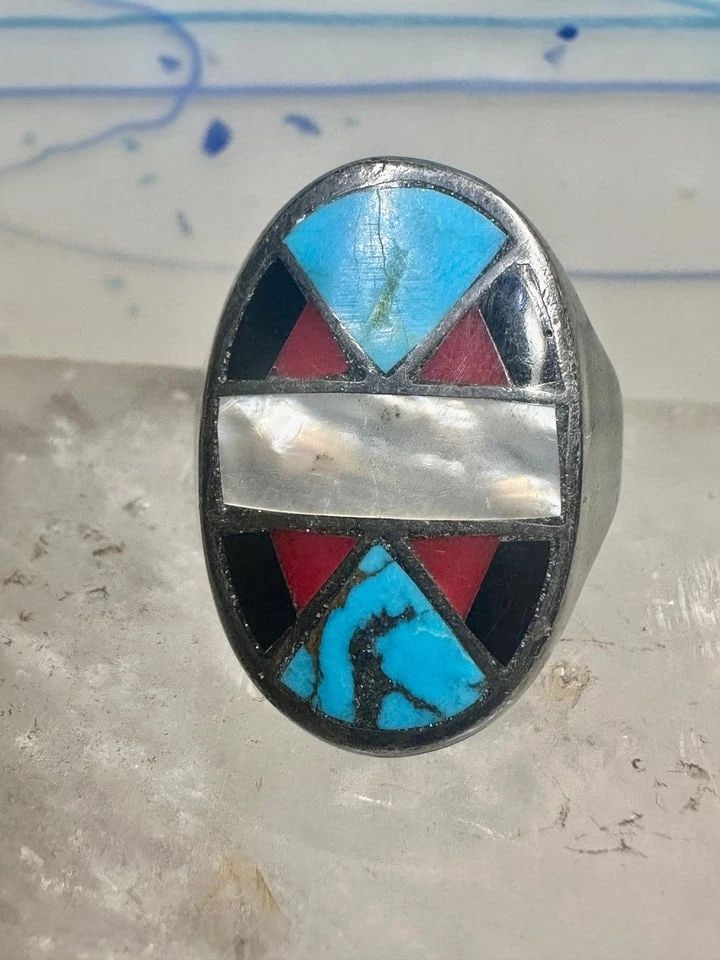 ZUNI RING TURQUOISE CORAL ONYX MOP SIZE 12.50 STERLING SILVER WOMEN MEN: ZUNI RING TURQUOISE CORAL ONYX MOP SIZE 12.50 STERLING SILVER WOMEN MEN Zuni ring Turquoise Coral Onyx MOP size 12.50 sterling silver women men Size 12.50 Weight 15.7g Length. 1 1/8" Width 5/8" Thinne
