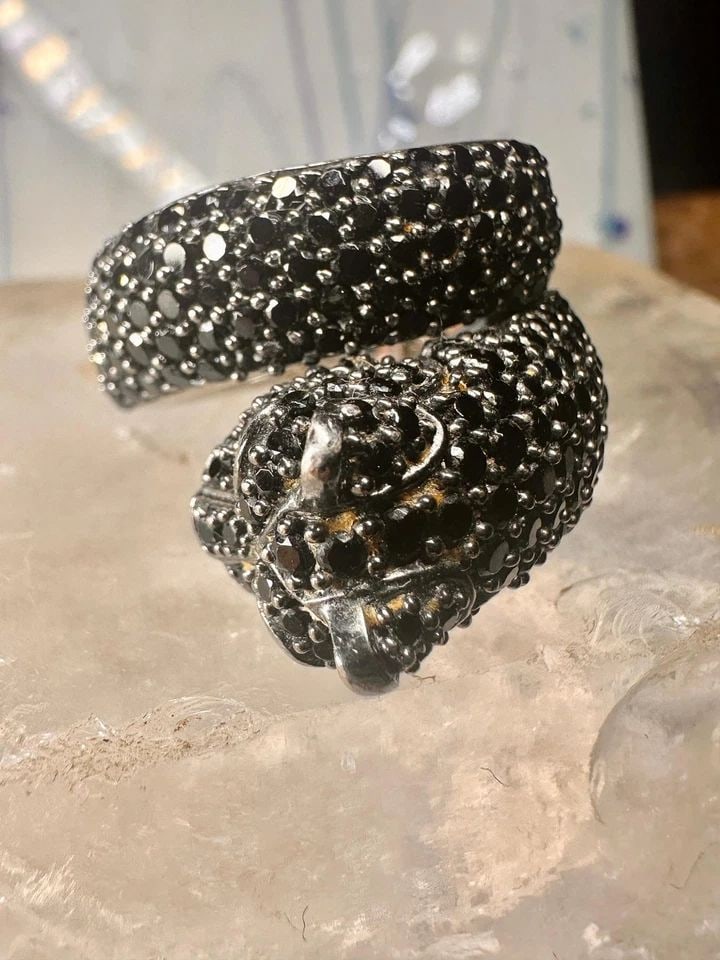 SONIA BITTON RING PANTHER BAND CZ SIZE 6.75 STERLING SILVER WOMEN: SONIA BITTON RING PANTHER BAND CZ SIZE 6.75 STERLING SILVER WOMEN Sonia Bitton ring Panther band CZ size 6.75 sterling silver women Size 6.75 Weight 14.5g Widest part 3/4" Thinnest part of band. 1/4"