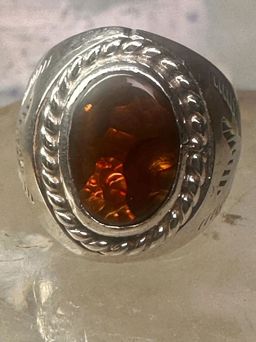 FIRE AGATE RING NAVAJO BAND SIZE 8.50 STERLING SILVER WOMEN MEN: FIRE AGATE RING NAVAJO BAND SIZE 8.50 STERLING SILVER WOMEN MEN Fire Agate ring Navajo band size 8.50 sterling silver women men Size 8.50 Weight. 10g Length 5\7/8" Width. 3/8" Thinnest part of band 1/