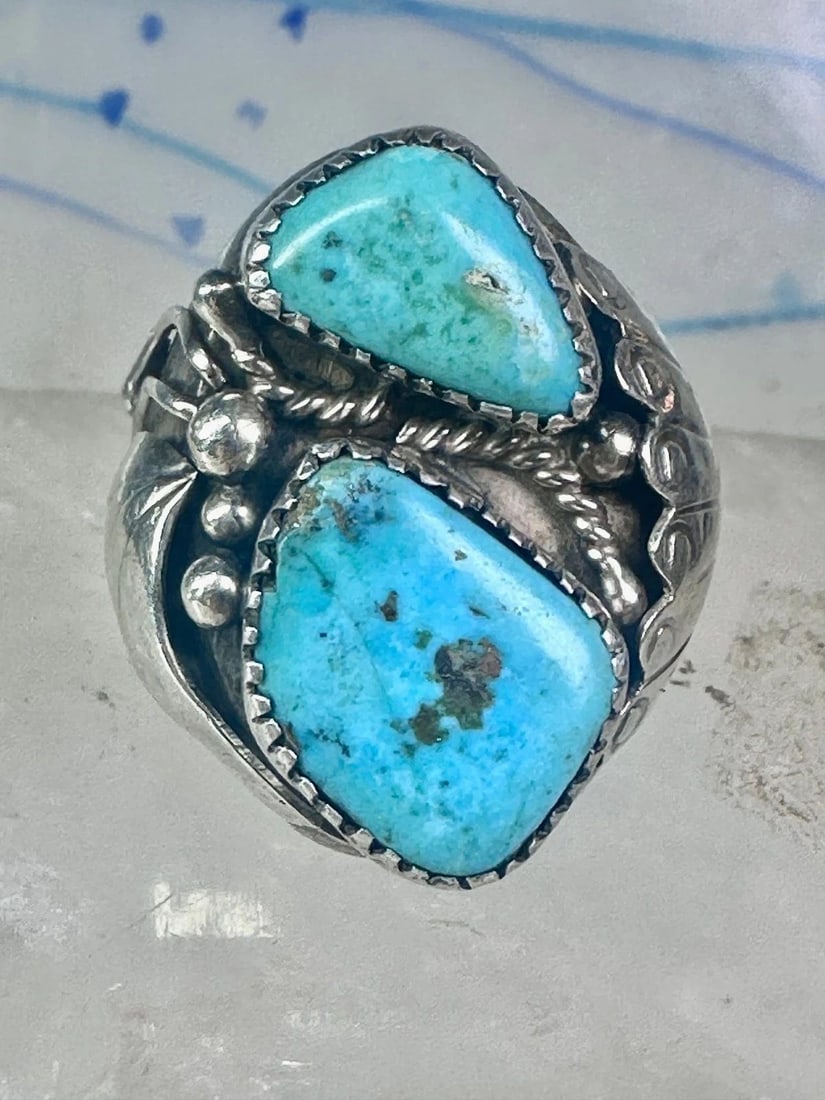 NAVAJO RING TURQUOISE SIZE 10 STERLING SILVER BAND WOMEN MEN: NAVAJO RING TURQUOISE SIZE 10 STERLING SILVER BAND WOMEN MEN Navajo ring Turquoise size 10 sterling silver band women men Size 10 Weight 22.9g Length. 1. 1/8" Width 5/8" Thinnest part of band 7/32"