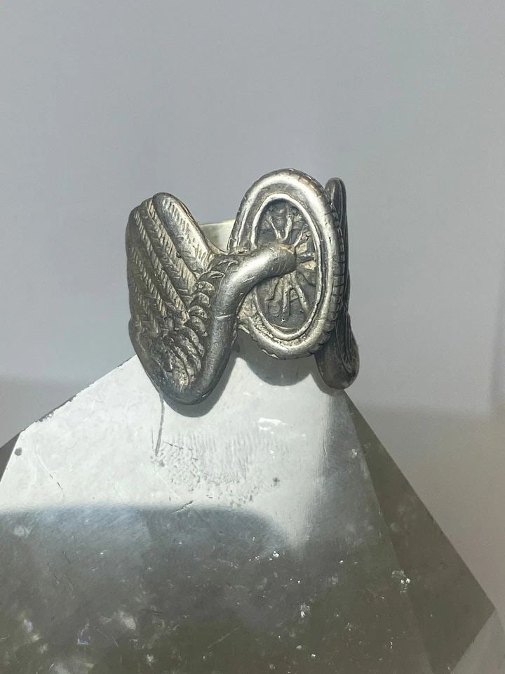 MOTORCYCLE RING WHEEL BIKER BAND STERLING SILVER BAND WOMEN MEN: MOTORCYCLE RING WHEEL BIKER BAND STERLING SILVER BAND WOMEN MEN Motorcycle ring wheel biker band sterling silver band women men Size 8 Weight 14.4g Length. 7/8" Width. 1/4" Thinnest 5/32"