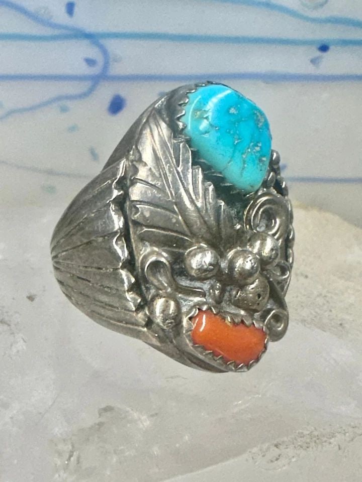 NAVAJO RING TURQUOISE CORAL BAND SIZE 9.75 STERLING SILVER WOMEN MEN: NAVAJO RING TURQUOISE CORAL BAND SIZE 9.75 STERLING SILVER WOMEN MEN Navajo ring turquoise coral band size 9.75 sterling silver women men Size 9.75 Weight 18.1g Length. 1 Width 3/4" Thinnest part of b